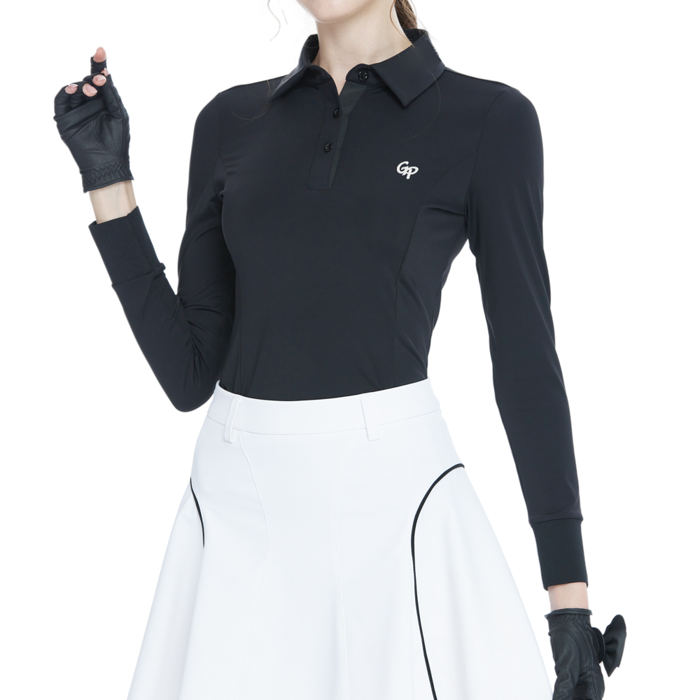 Black long-sleeved top with rhinestone embellishments and a turn-down collar.